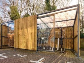 Cycle shelter with lockable sliding gate