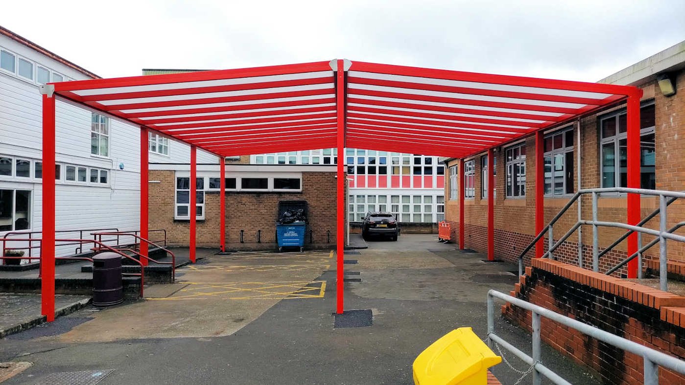 outdoor dining canopy in a courtyard at a secondary school